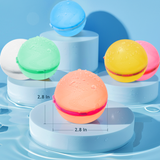 a group of colorful balls on a white pedestal with text: '2.8 --- 2.8'