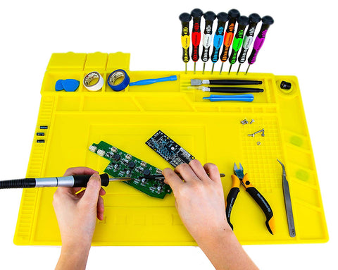 a hand holding a screwdriver with text: 'Titanium AVEN Wiha Professional ESD wire 1.0 max.'