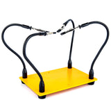 a yellow rectangular object with black wires