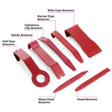 a collection of red plastic tools with text: 'Wide-Type Remover Narrow-Type Remover Upholstery Clip Remover Handy Remover Pull-Type Remover Sharp Panel Panel Remover Remover'