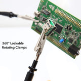 a close-up of a circuit board with text: 'UUUUUUU 360º Lockable Rotating Clamps'