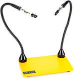 a yellow rectangular object with black wires with text: '- KOTTO'