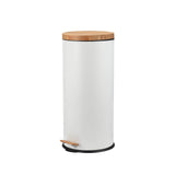 a white round trash can with a wooden lid