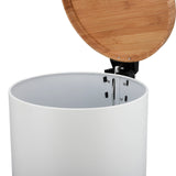 a white cylinder with a wooden lid